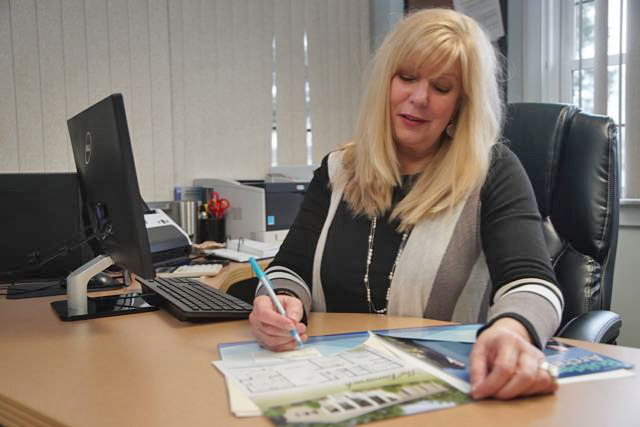 Darlene Looking at Paper Work