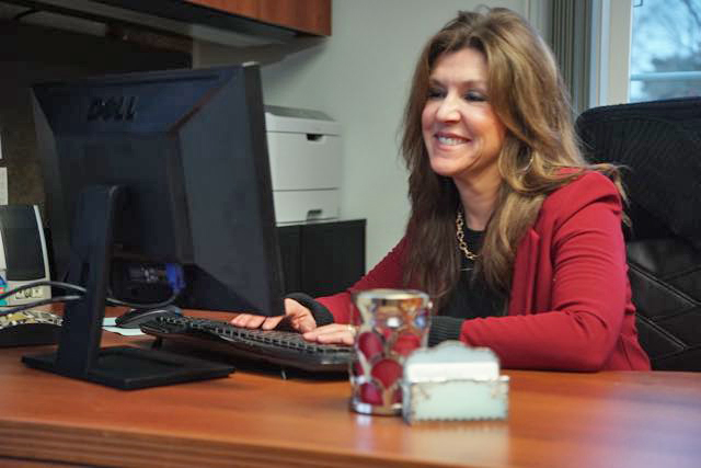 Roe at her desk