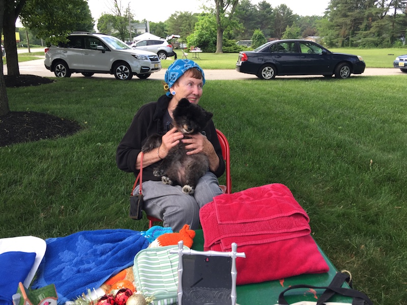 Summerfields Friendly Village Yard Sale resident with her dog