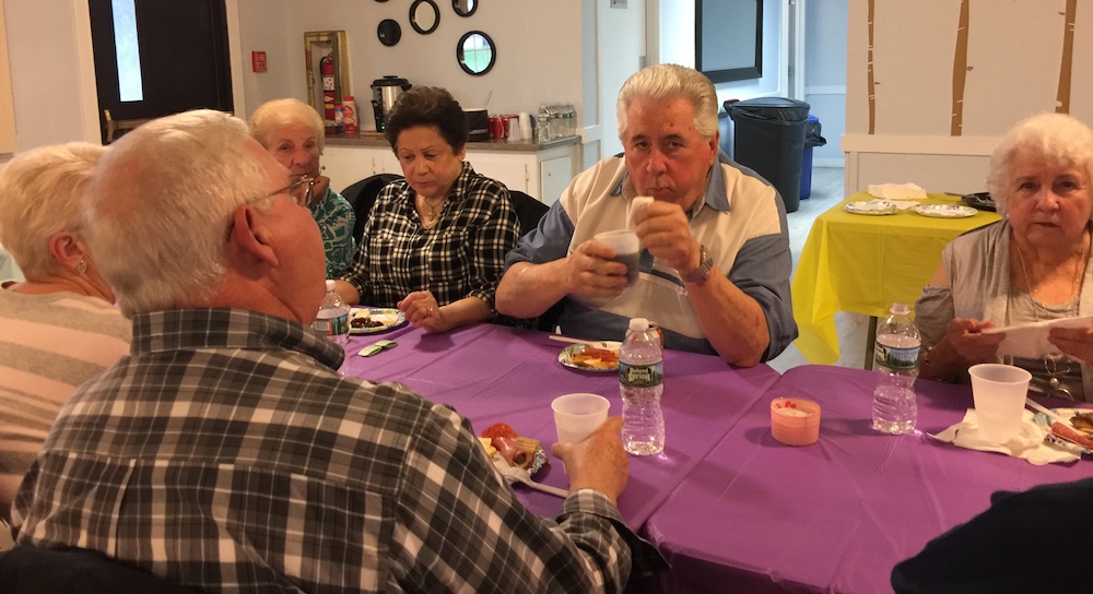 Summerflied Friendly Village MHOA Welcomes Summer Residents enjoying their food