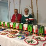 Elves helping to fill the bags with cookies