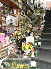 Flowers on stairs Antiques